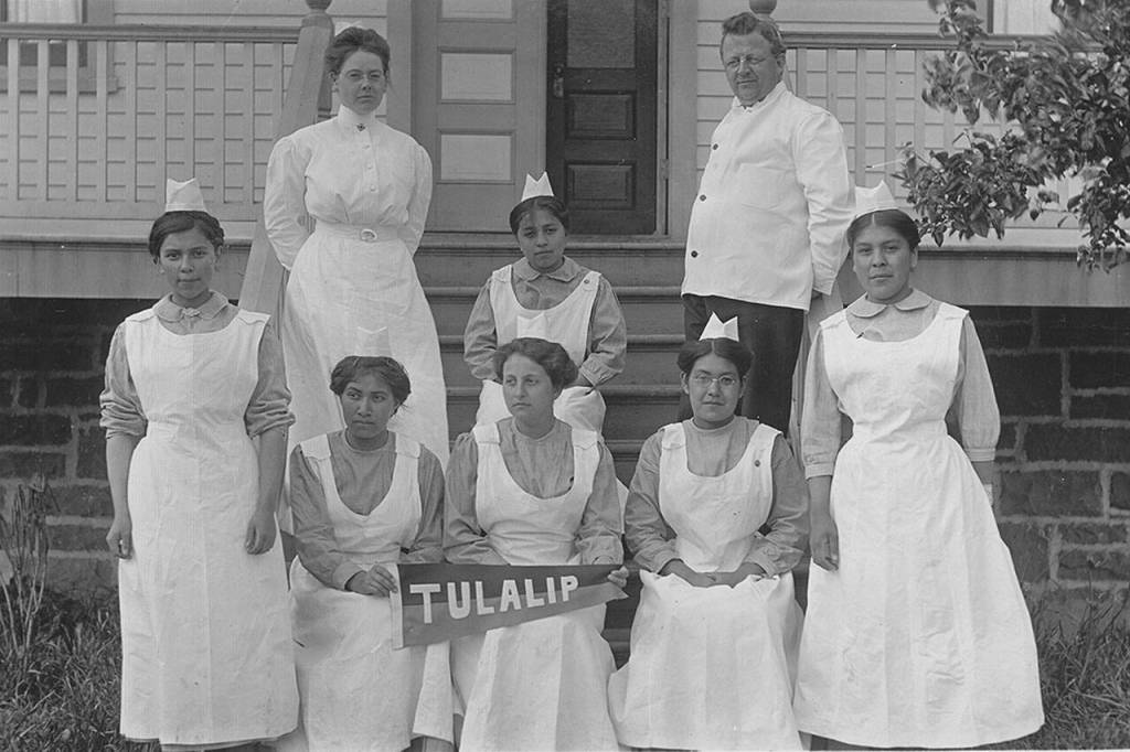 Some Tulalip Indian School students served as part-time nurses in the hospital on the reservation. Dr. Charles Milton Buchanan (back right) was a physician and the schools superintendent. (Courtesy of Hibulb Cultural Center)