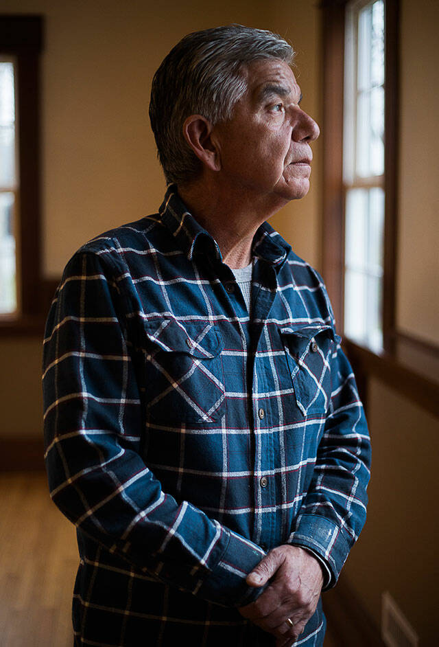 Tulalip elder Les Parks has amassed a history of the Tulalip Mission School and its successor, the federal Tulalip Indian School, while researching his family. His ancestors, beginning with his great-great-grandfather, attended the schools. (Olivia Vanni / The Herald)
