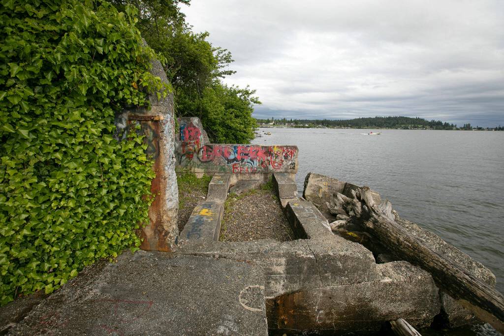 The ruins of a federal jail on the beach of Tulalip Bay are seen on June 13, behind the Tulalip Montessori School in Tulalip. (Ryan Berry / The Herald)