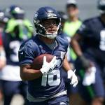 Seattle Seahawks wide receiver Tyler Lockett runs during NFL football practice, Tuesday, May 31, 2022, in Renton, Wash. (AP Photo/Ted S. Warren)