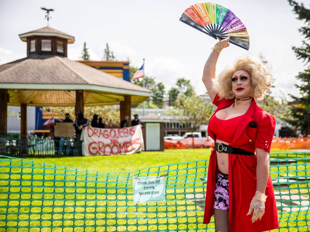 Murphys Lala tells Arlingtons first-ever Pride celebration crowd to pay them no mind in response to protestors Saturday. (Olivia Vanni / The Herald)