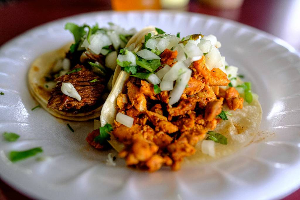 The chicken and beef cheek (barbacoa) tacos at Omars in Lynnwood. (Taylor Goebel / The Herald)