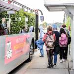 Students load a bus near Sequoia High School in Everett, Washington on May 25, 2022.  (Kevin Clark / The Herald)