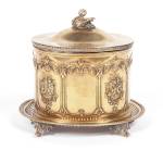 Every food you might find on a Victorian table had its own silver-plated dish. This English silver-plated jar was used for cookies or bisquits.