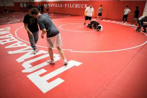 Tony Hatch coaches wrestling practice at Marysville Pilchuck High School on Monday, Dec. 13, 2021 in Marysville, Wa. (Olivia Vanni / The Herald)