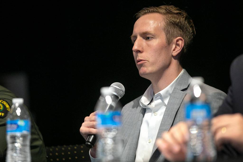 Councilmember Nate Nehring speaks during a public safety town hall meeting Wednesday at the Marysville Opera House in Marysville. (Ryan Berry / The Herald)