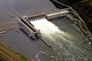 FILE - In this May 15, 2019 photo, the Lower Granite Dam on the Snake River is seen from the air near Colfax, Wash. A report released Thursday, June 9, 2022, said the benefits provided by four giant hydroelectric dams on the Snake River in Washington state can be replaced if the dams are breached to save endangered salmon runs. But finding other ways to provide electricity, irrigation and enabling commerce would cost up to $27.2 billion, the report said. (AP Photo/Ted S. Warren, File)
