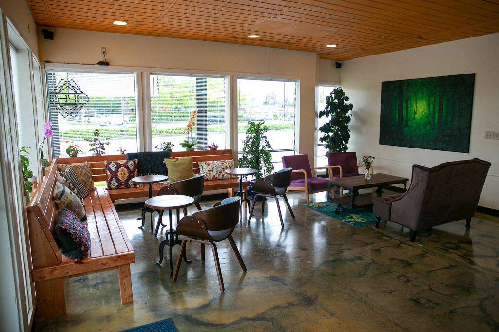 The dining area is brightly lit with plenty of seating at Cup & Crêpe on Everett Mall Way in Everett. (Ryan Berry / The Herald)