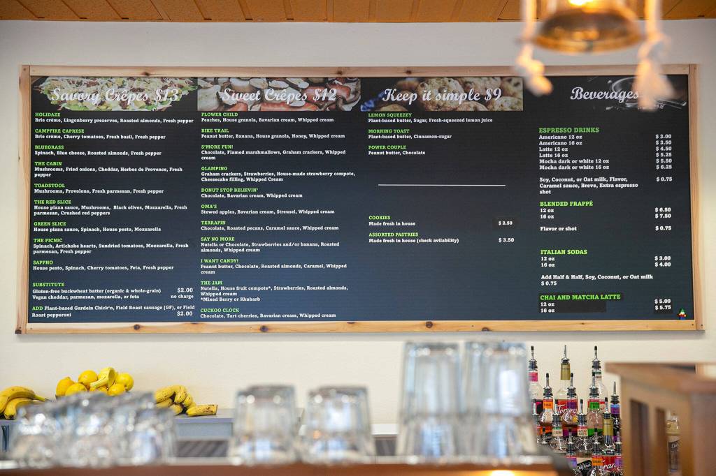 The menu features both sweet and savory options, along with coffee drinks, at Cup & Crêpe on Everett Mall Way in Everett. (Ryan Berry / The Herald)