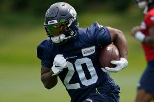 Seattle Seahawks running back Rashaad Penny runs a drill during NFL football practice Wednesday, June 8, 2022, in Renton, Wash. (AP Photo/Ted S. Warren)