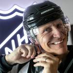 Vaughan Rody dons his linesman gear for the first time since his final NHL game in April, on Monday, June 6, 2022, at his home in Lake Stevens, Washington. Rody officiated in the National Hockey League for 23 seasons. (Ryan Berry / The Herald)