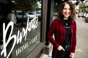 Holly Burkett-Pohland, the owner of Burkett’s Home & Gift, outside of her new store front on Friday, June 17, 2022 in Everett, Washington. (Olivia Vanni / The Herald)