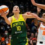 Seattle Storm’s Sue Bird drives to the hoop for a layup during the game against the Connecticut Sun on Sunday, June 5, 2022 in Seattle, Washington. (Olivia Vanni / The Herald)