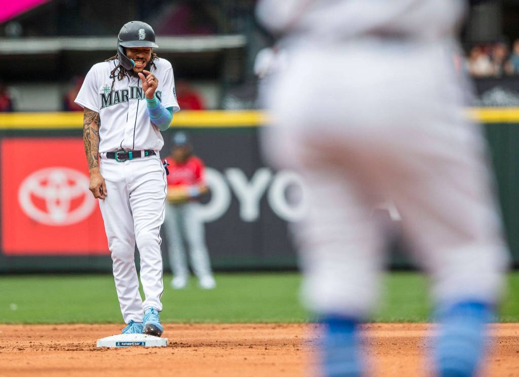 Mariners J.P. Crawford gestures to the first base coach during the game against the Angels on Sunday, June 19, 2022 in Seattle, Washington. (Olivia Vanni / The Herald)