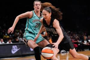 Seattle Storm guard Sue Bird (10) drives against New York Liberty guard Sabrina Ionescu (20) during the first half of WNBA basketball game Sunday, June 19, 2022 at Madison Square Garden in New York. (AP Photo/Mary Altaffer)