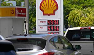 FILES - Cars line up at a Shell gas station June 17, 2022, in Miami. President Joe Biden on June 22 will call on Congress to suspend the federal gasoline and diesel taxes for three months. It's a move meant to ease financial pressures at the pump that also reveals the political toxicity of high gas prices in an election year. (AP Photo/Marta Lavandier, File)