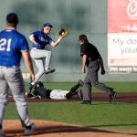 The Everett Merchants Cole Cramer, from Arlington, catches a throw down to second base during a game against the Seattle Blackfins on Wednesday, June 22, 2022, at Funko Field in Everett, Washington. (Ryan Berry / The Herald)