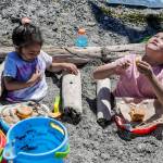 “Nature loungers” Leia Fania, 5, and Luke Fania, 7, enjoy the weather, have lunch and eye the birds on the Mukilteo beach in  Mukilteo, Washington on June 24, 2022. (Kevin Clark / The Herald)