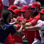 Seattle Mariners J.P. Crawford, left, and several members of the Los Angeles Angels scuffle after Mariners Jesse Winker was hit by a pitch during the second inning of a game Sunday in Anaheim, Calif. (AP Photo/Mark J. Terrill)