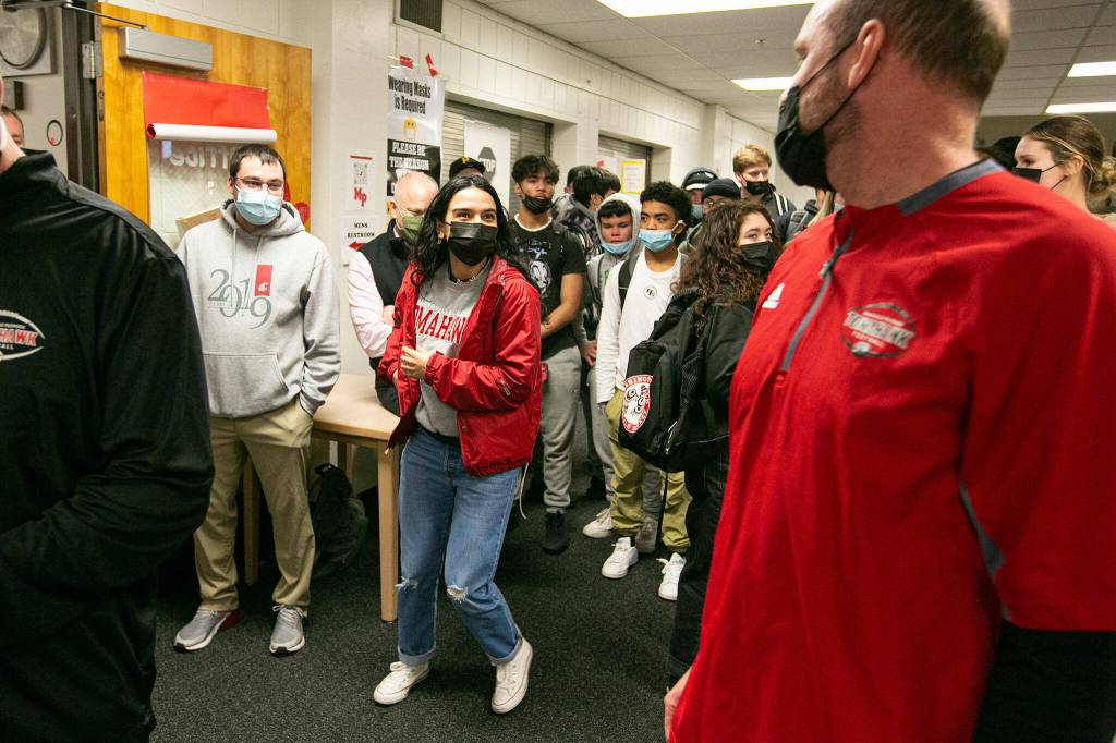 Elizabeth Martinez arrives as a late addition to the festivities during National Signing Day Wednesday, Feb. 2, 2022, at Marysville Pilchuck High School in Marysville, Washington. (Ryan Berry / The Herald)