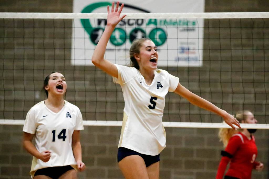 Arlingtons Emily Mekelburg (5) celebrates during a match at Arlington High School on Sept. 29, 2021. (Kevin Clark / The Herald)