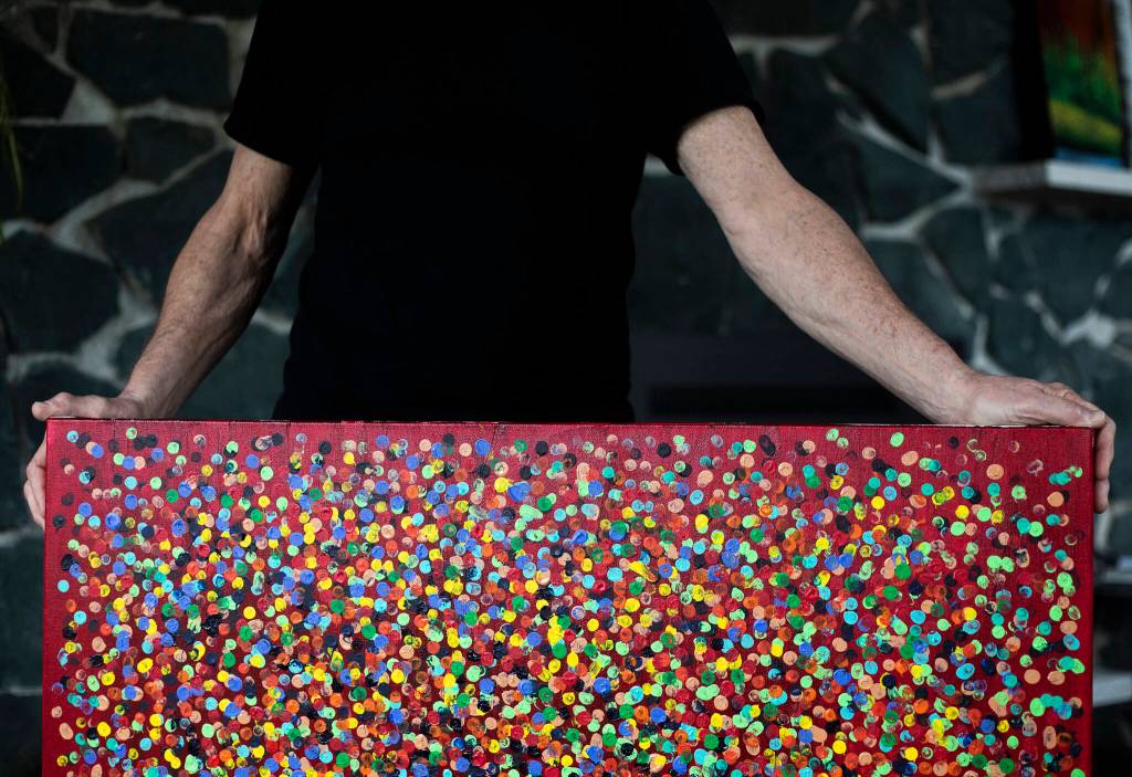 One of Oskars paintings featured on his album Never Forget. (Olivia Vanni / The Herald)