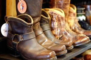 Fauxy Furr in Arlington, Washington upcycles boots with custom trimmings. Their boots proved popular with customers from overseas. Photographed on February 8, 2022.  (Kevin Clark / The Herald)