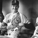 Newly acquired Seattle Mariners pitcher Randy Johnson shows off a Montreal Expos shirt under his Mariners jersey at the Kingdome. (Dan Bates / The Herald)