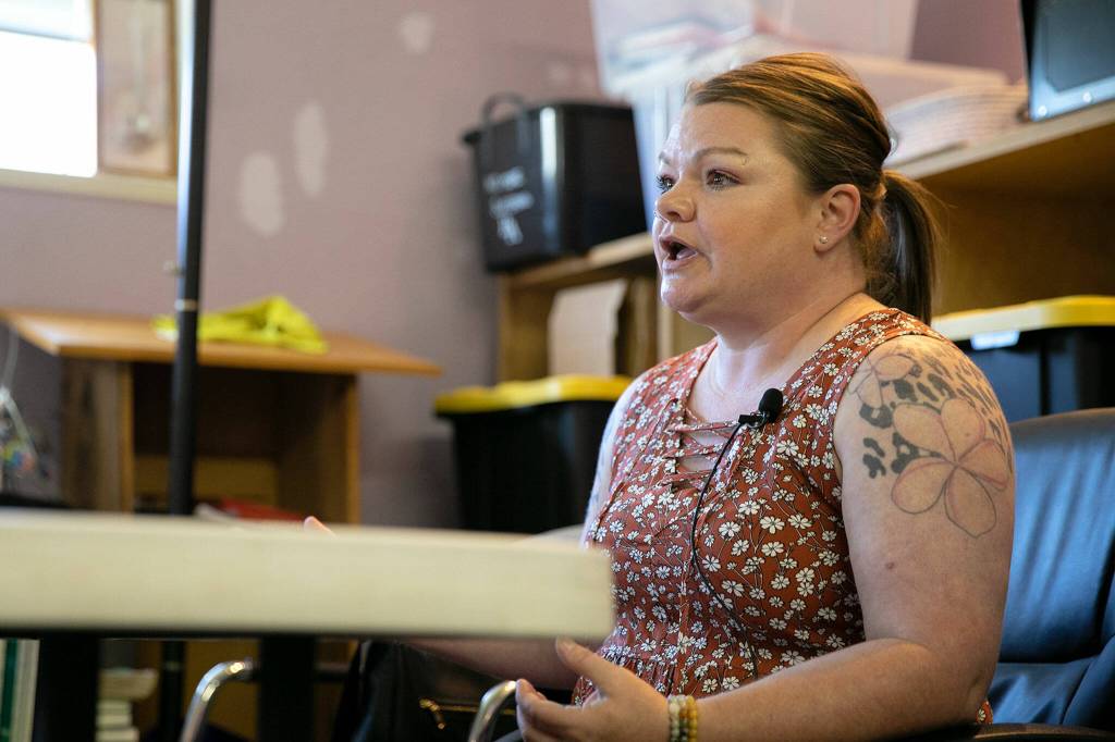Jennifer Cunningham speaks about her experience getting an education during a Second Chance Foundation graduation party on June 26, in Everett. (Ryan Berry / The Herald)