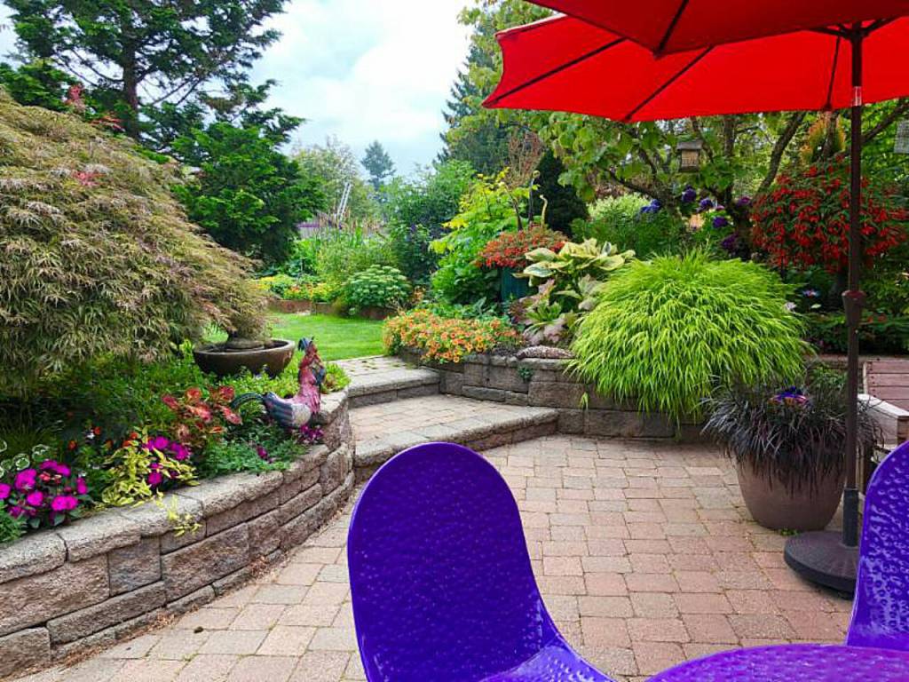 Many plants in containers need daily watering during the warm, dry summer months. (Sunnyside Nursery)