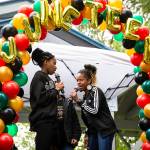 Junelle Lewis, right, daughter Tamara Grigsby and son Jayden Hill sing “Lift Every Voice and Sing” during Monroe’s Juneteenth celebration on Saturday, June 18, 2022. (Olivia Vanni / The Herald)