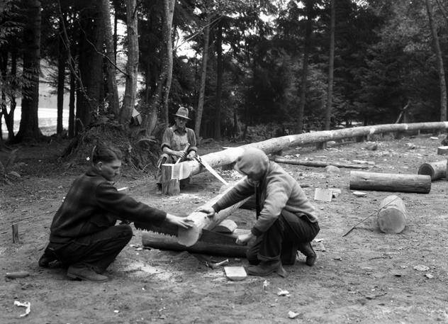 Washington State Archives photo
Civilian Conservation Corps members build log guild rails in the park in May 1934. The log guard rails are a well known detail in the famous park.