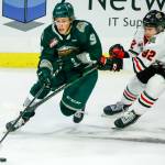 The Silvertips Ben Hemmerling controls the puck with Portlands OBrien Jack trailing in the second period of a game on Oct. 8, 2021, at Angel of the Winds Arena in Everett. (Kevin Clark / The Herald)