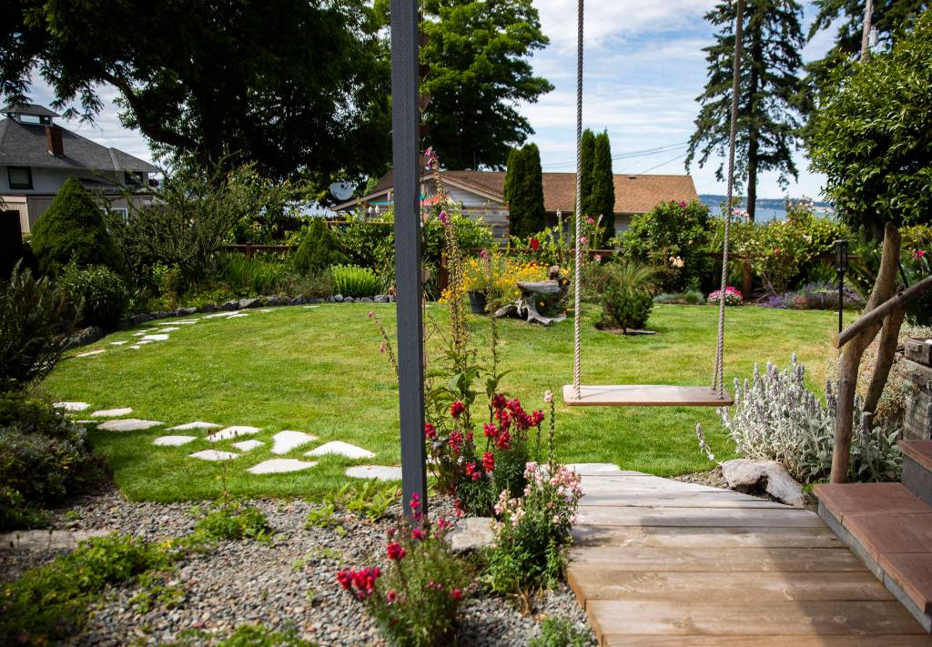 A view from the porch of the Mukilteo Garden Quilt Tour home of gardeners MaryJane Cavanagh and Les Nelson. The tour is July 16 and 17. (Olivia Vanni / The Herald)