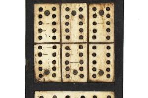 Photo Caption: Cribbage is a centuries-old travel game. In the 19th century, sailors on whaling ships made and used boards like this one to pass the time on long voyages.