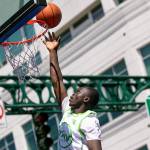 Masamba Njadoe from MUV Elite puts in a layup during the Men’s Elite Championship at Everett 3on3 Sunday, July 10, 2022, in downtown Everett, Washington. (Ryan Berry / The Herald)