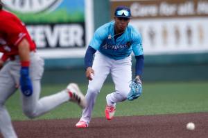 The AquaSox’s Noelvi Marte starts a double play during a game against the Vancouver Canadians Wednesday, July 6, 2022, at Funko Field in Everett, Washington. (Ryan Berry / The Herald)