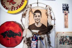 Photos and mementos of Andrew Fryberg hang on the wall inside his mothers home on Wednesday, July 13, 2022 in Tulalip, Washington. (Olivia Vanni / The Herald)