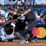 American League's Giancarlo Stanton, of the New York Yankees, connects for a two-run home run during the fourth inning of the MLB All-Star baseball game against the National League, Tuesday, July 19, 2022, in Los Angeles. (AP Photo/Jae C. Hong)