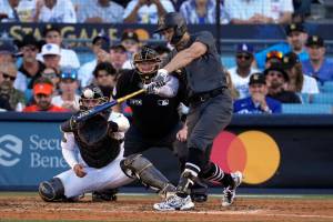 American League's Giancarlo Stanton, of the New York Yankees, connects for a two-run home run during the fourth inning of the MLB All-Star baseball game against the National League, Tuesday, July 19, 2022, in Los Angeles. (AP Photo/Jae C. Hong)