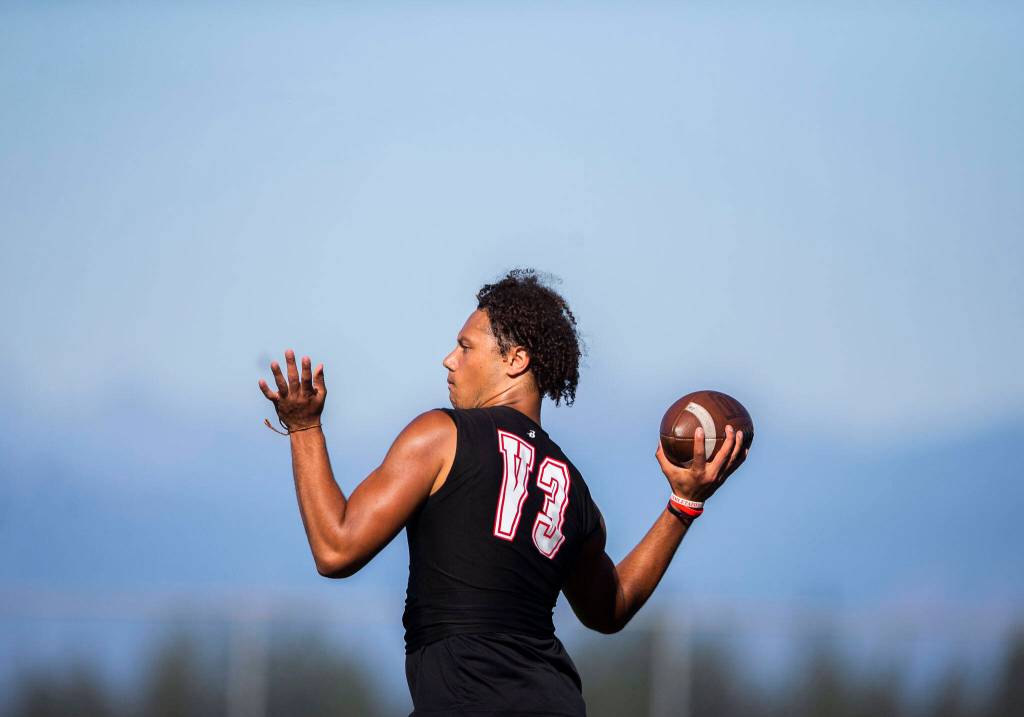 Archbishop Murphys Kai Lewis throws a pass during a 7on7 game at Glacier Peak High School on Wednesday, July 20, 2022 in Snohomish, Washington. (Olivia Vanni / The Herald)