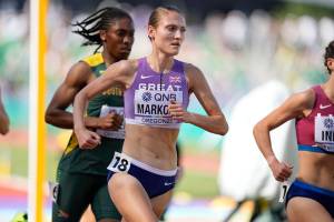 Amy-Eloise Markovc, of Britain, competes during a heat in the women's 5000-meter run at the World Athletics Championships on Wednesday, July 20, 2022, in Eugene, Ore. (AP Photo/Ashley Landis)