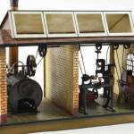 Bing of Nuremberg, Germany, is one of the most famous toy companies of the late 1800s to early 1900s. They made this miniature factory, which may have been an educational model or a children's toy.