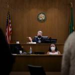 Superior Court Presiding Judge George Appel delegates cases during court at the Snohomish County Courthouse on Wednesday, in Everett. (Olivia Vanni / The Herald)
