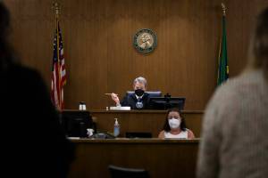 Superior Court Presiding Judge George Appel delegates cases during court at the Snohomish County Courthouse on Wednesday, Aug. 3, 2022 in Everett, Washington. (Olivia Vanni / The Herald)