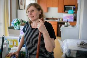 Olesia Tanasiichuk talks about the challenges of uprooting from Ukraine with her mother and two daughters at their new home in Snohomish, Washington on July 25, 2022. (Kevin Clark / The Herald)