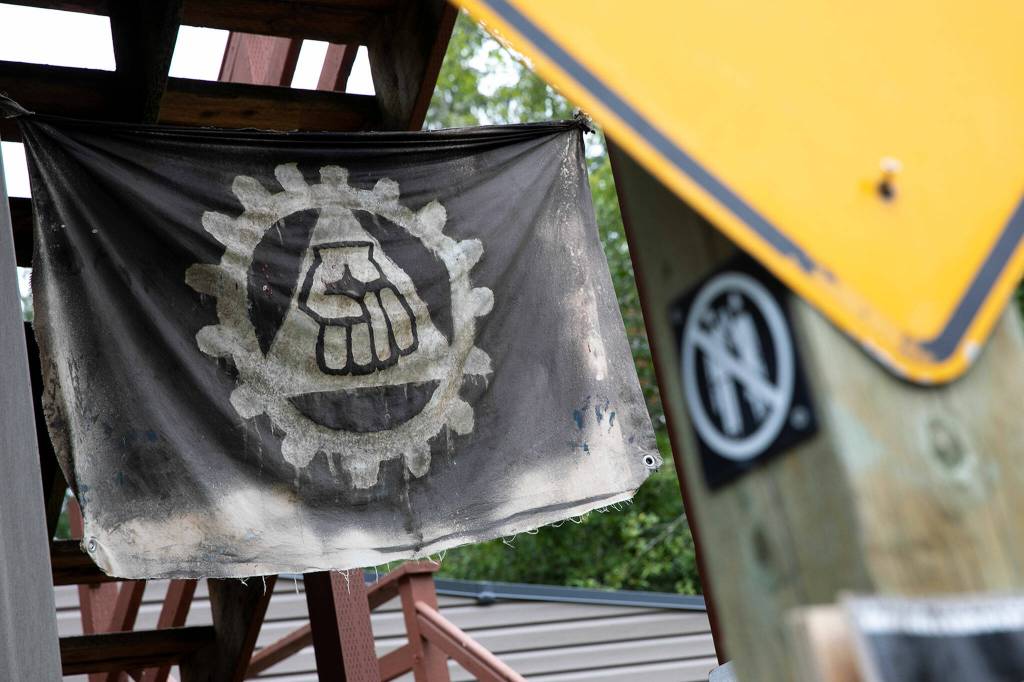 The HaazLab logo, hangs in front of Josh Haazards workshop. (Ryan Berry / The Herald)