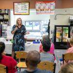 Tiffany Smiley, who is running as a Republican for U.S. Senate, speaks to a small group of supporters on July 28, at the Chevron Gas Station on Everett Mall Way in Everett. (Ryan Berry / The Herald)