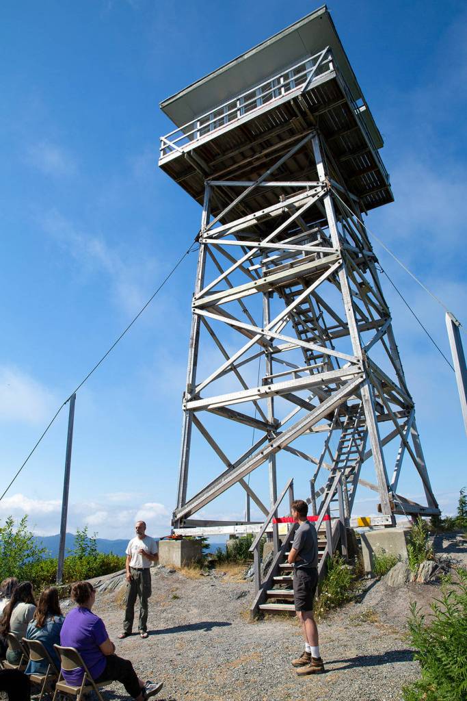 Paul Wagner gives a brief speech during an official reopening ceremony for the North Mountain Fire Lookout on Wednesday, Aug. 10, north of Darrington. (Ryan Berry / The Herald)