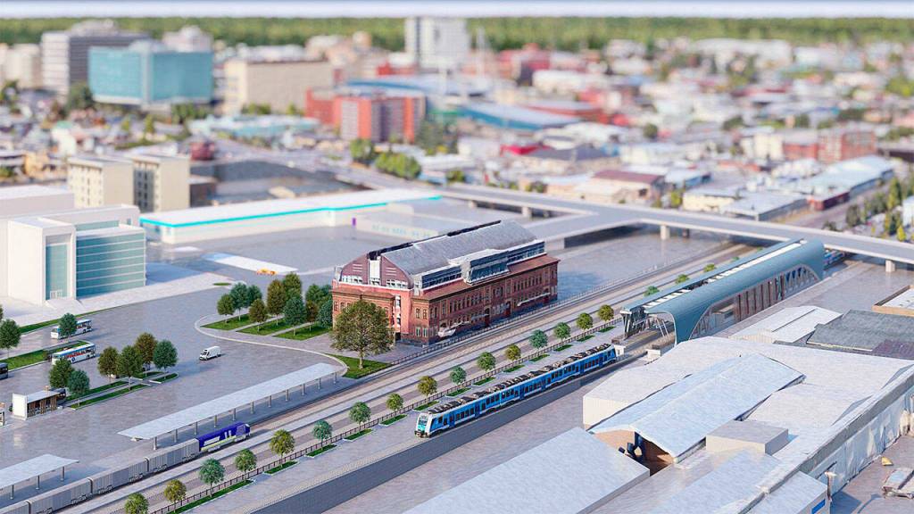 Alternative X, an idea by the Everett Station District Alliance for the light rail alignment and platform near the current transit hub, is imagined to run parallel to and east of the existing train tracks. (Jennifer Cao / Everett Station District Alliance)